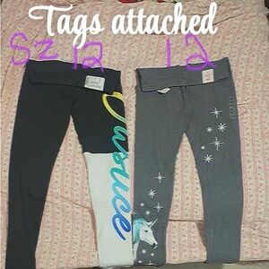 Justice Girls' Gray unicorn and Black Leggings Set both have sparkles in design.
